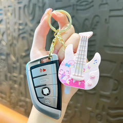 MUSICAL GUITAR KEYCHAIN SPARKLES