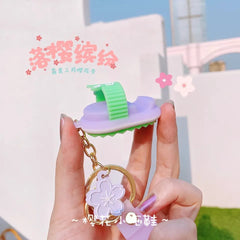 SAKURA SLIPPER KEYCHAIN SPARKLES