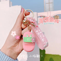 SAKURA SLIPPER KEYCHAIN SPARKLES